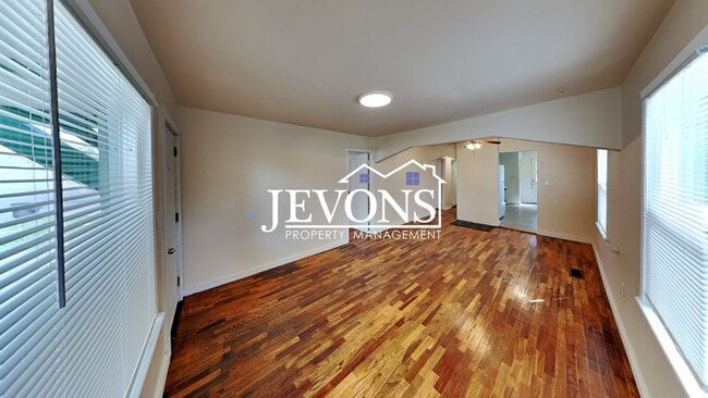 Building Photo - Step into your new residence, a charming s...