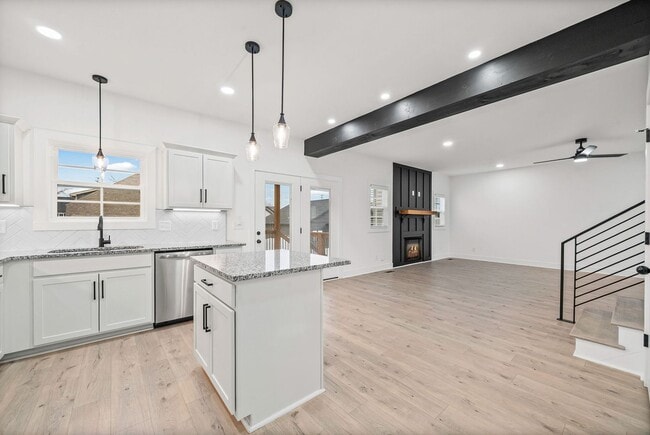 Building Photo - Pet Friendly Three Bedroom with Bonus!