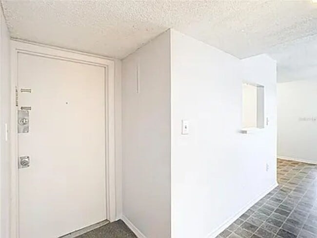 Building Photo - 2BR Condo Near UCF – All-Inclusive Living & Resort Amenities!