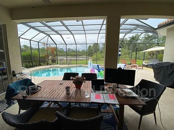 Building Photo - 4-Bedroom W/Den Lakefront Pool Home with Spa in Gated Promenade East at The Forum