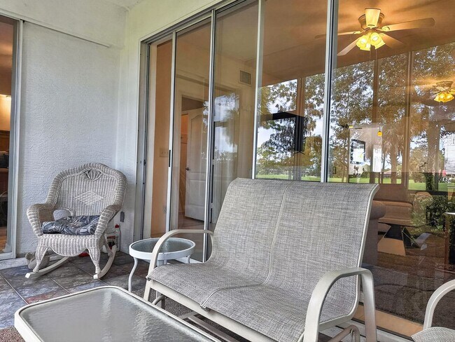 Building Photo - Beautifully furnished 2BR/2BA first-floor condo