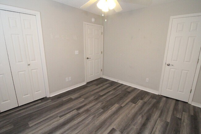 Building Photo - Live the Gulf Breeze Waterfront Life – Dock, Canal Access & Boat Lift!