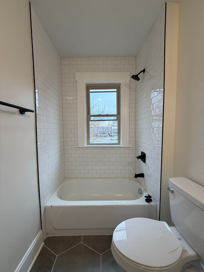 Building Photo - Rare 2-Full Bath Find: Pristine Renovation with Designer En-Suite & Granite