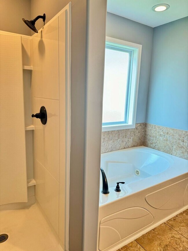 Building Photo - Large Open 4 Bedroom Home with Bonus! Tree Lined Backyard with Privacy Fence!