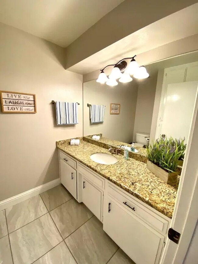 Building Photo - Step into your new residence, a charming c...