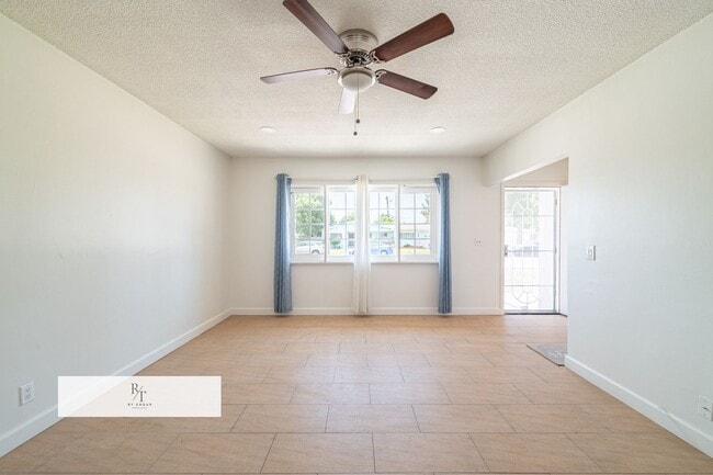 Building Photo - Remodeled House with Spacious Flat Lot - L...