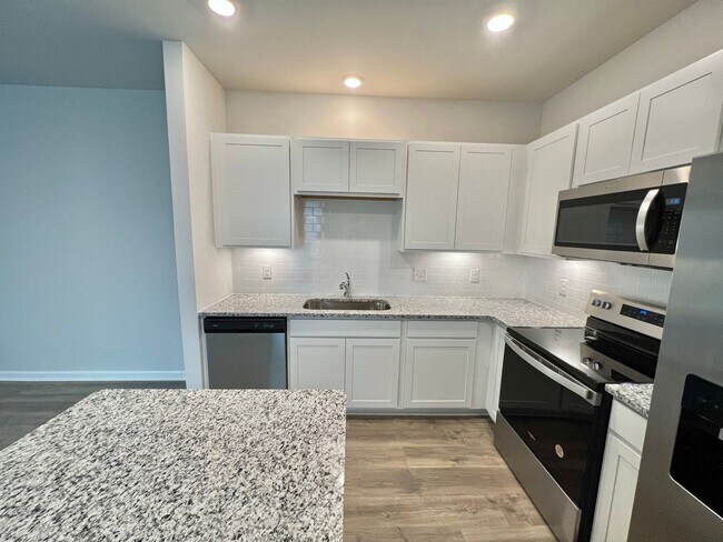 Building Photo - New 3 Bedroom, 2.5 Bathroom Townhouse w/ C...