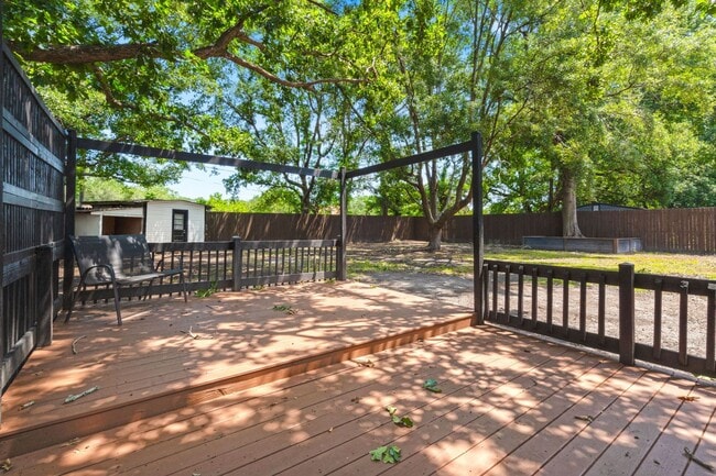 Building Photo - Spacious Split-Level Living with Dual Fireplaces & Expansive Deck