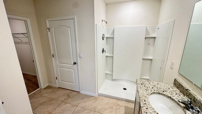 Building Photo - Available NOW! Spacious 4BD/2BA Haven in Villages at Harmony – Your Dream Home Awaits! WASHER & D...