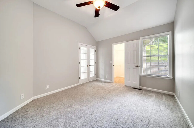 Master bedroom showing entry to hallway, bath and laundry - 129 Cherry Hill Dr