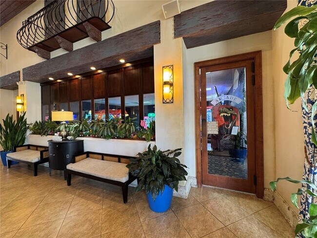Building Photo - 8977 Coco Palm Rd