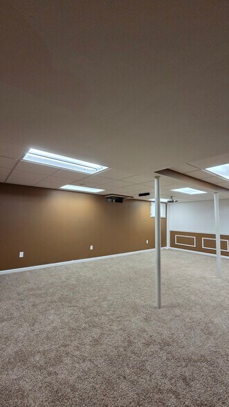 Finished basement with theater system - 653 Glasgow Ct