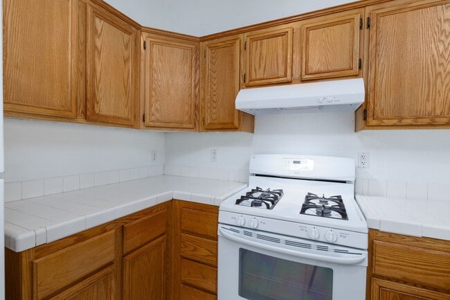 Building Photo - Refurbished upstairs two bedroom in well maintained East side gated complex