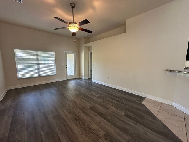 Building Photo - Spacious 4 Bedroom Home with Fenced Yard a...