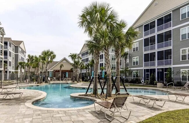 Building Photo - Dive Into Your New Oasis!
