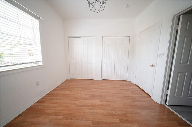 Building Photo - 5670 NW 116th Ave