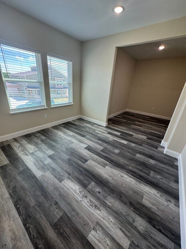Building Photo - COMING SOON.....Modern Townhome with private fenced yard! HIGH CEILINGS PETS WELCOME