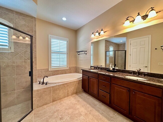 Building Photo - Gated Community! Walking Distance to the B...