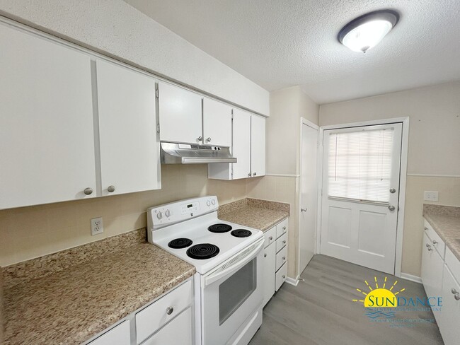 Building Photo - Spacious 3-Bedroom Condo with Community Am...