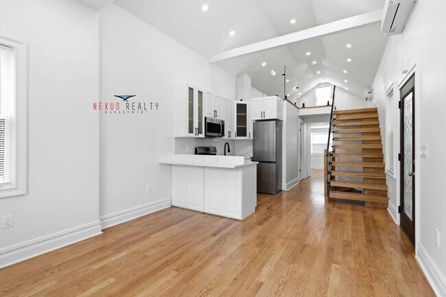 Building Photo - 21-28-28 48th St