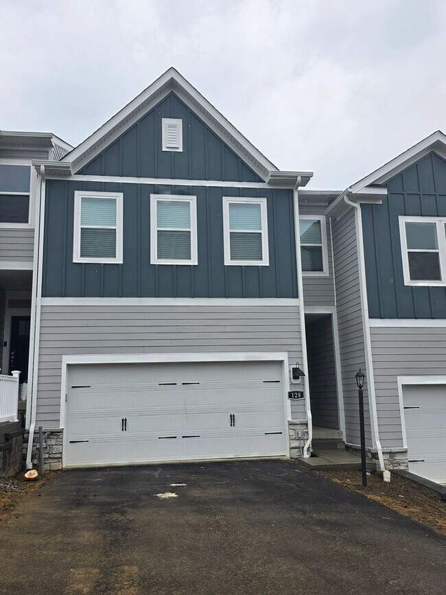 Building Photo - Luxury 4-Bedroom Townhome with Finished Walkout Basement & River Views