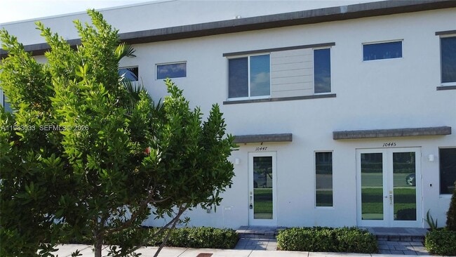 Building Photo - 10447 NW 66th St