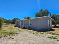 Building Photo - 3 bedroom 2 bath home in the country includes water electric and sewer