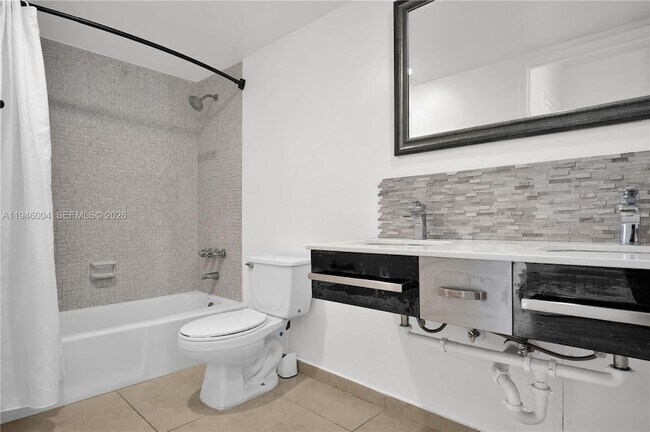 Building Photo - 19380 Collins Ave