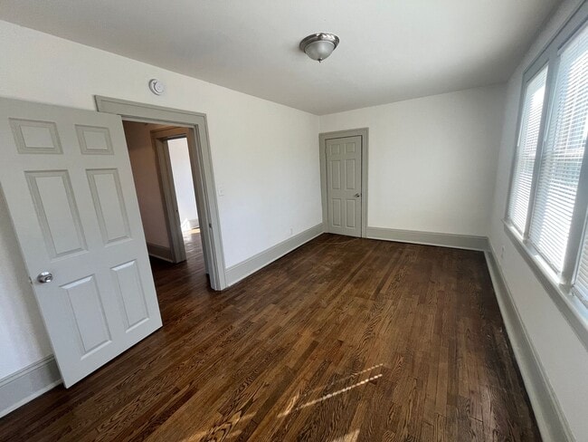 Building Photo - Spacious 4-Bedroom, 2-Bath Home with Porches & Basement