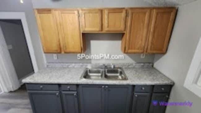 Building Photo - 9804 Miles Ave