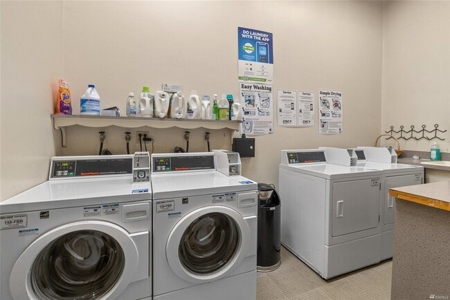 Lots of laundry capacity, all operated by app. Take the elevator, get notified when load is done - 730 Bellevue Ave E