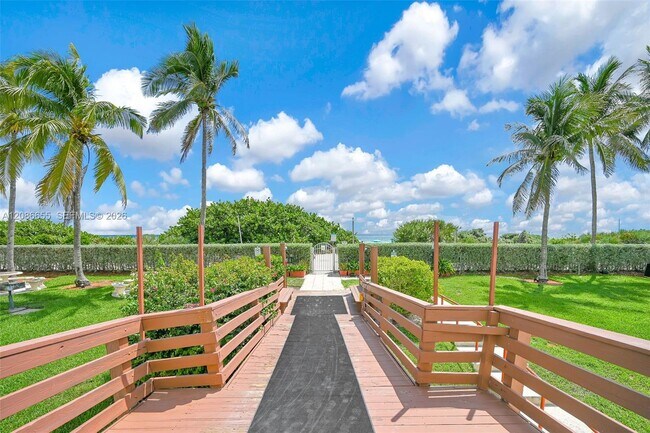 Building Photo - 6767 Collins Ave