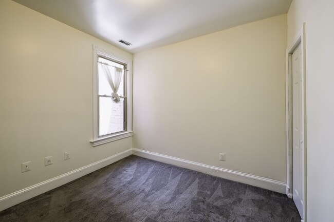 Building Photo - Historic & Charming 3BR Rowhouse near Howard is Move-in Ready!