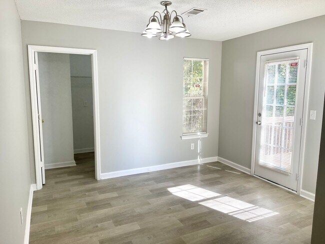 Building Photo - Welcome to this charming 3-bedroom, 2.5-bathroom home located in the desirable area of Ellenwood,...