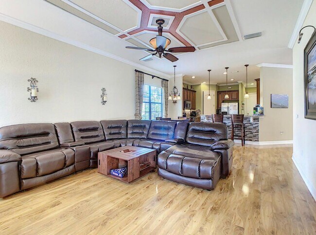 Building Photo - Luxury Living in Woodland Lakes Preserve: Fully-Furnished