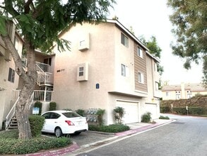 Building Photo - 2-Bedroom, 2-Bath Upstairs Condo Unit in Gated Pomona Community, Water/Trash/HOA Included!