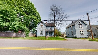 Building Photo - Freshly updated, large garage/small yard