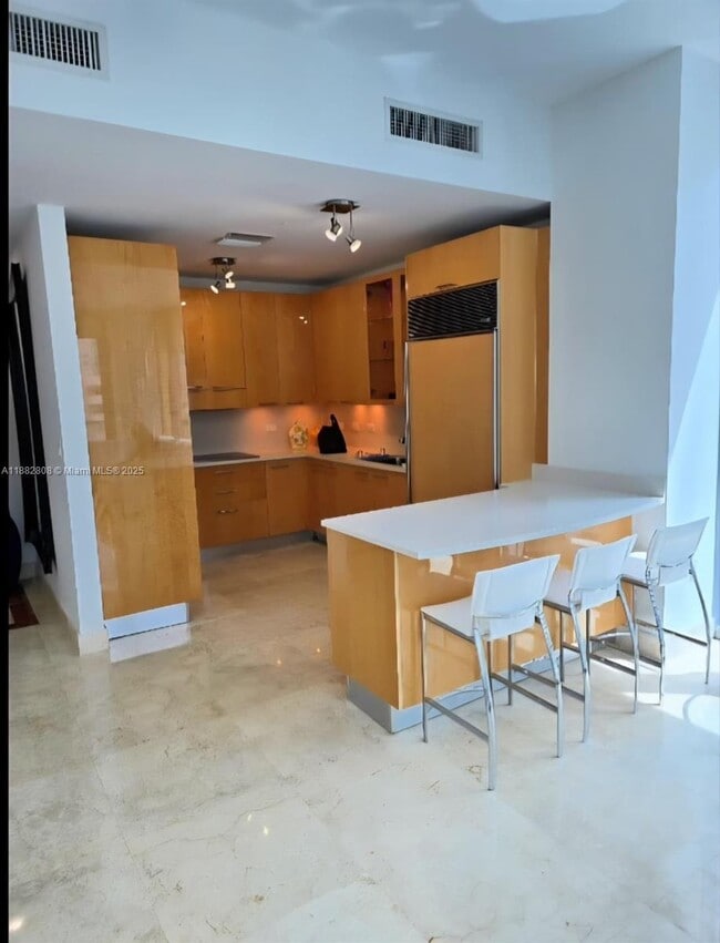 Building Photo - 6799 Collins Ave