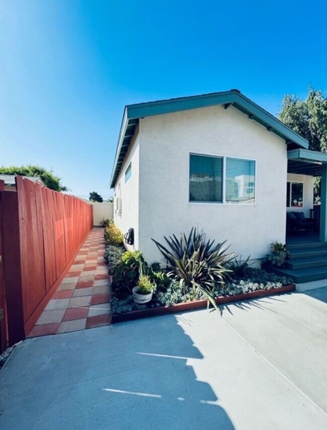 Building Photo - Coastal Luxury Living – Fully Furnished Home with Private Remote Gated Entry!
