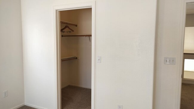 Building Photo - Townhome with Loft + Two Bedrooms/Baths - Designed for Comfort in Gated Community