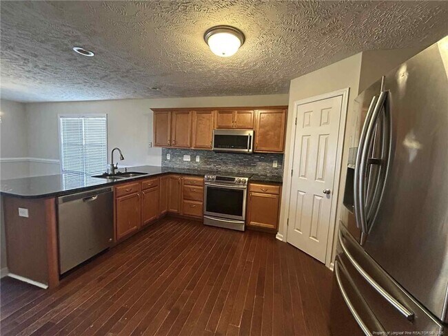 Building Photo - 5918 Lillytrotter Dr