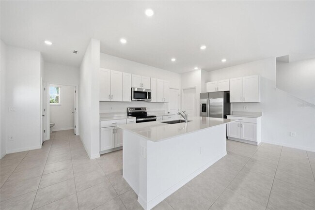 Building Photo - 8879 Coqui Song Ln