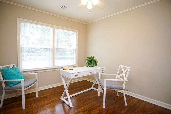 Building Photo - Gorgeous duplex unit on large lot with garage -- NO PETS ALLOWED