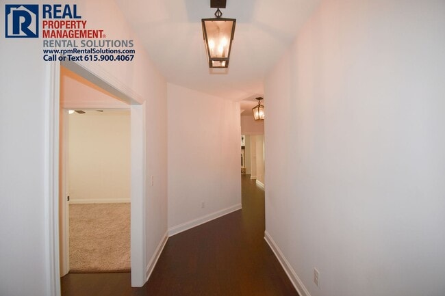 Building Photo - All brick 4 bedroom home plus Bonus room! Garage and covered patio!