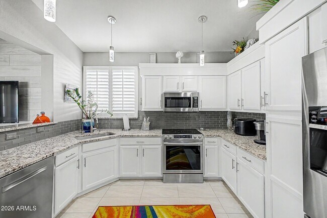 Building Photo - 9026 W Escuda Dr