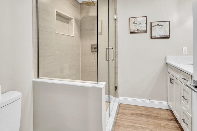 Building Photo - A spacious 3-bedroom, 2-bath layout provides plenty of room for family and guests!