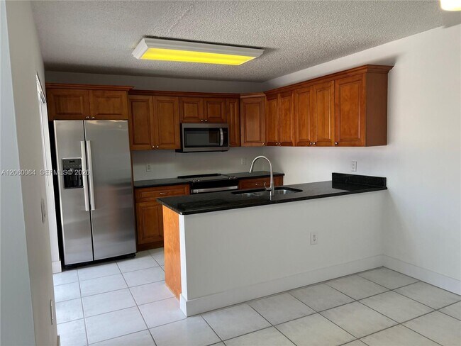 Building Photo - 9105A SW 19th Pl