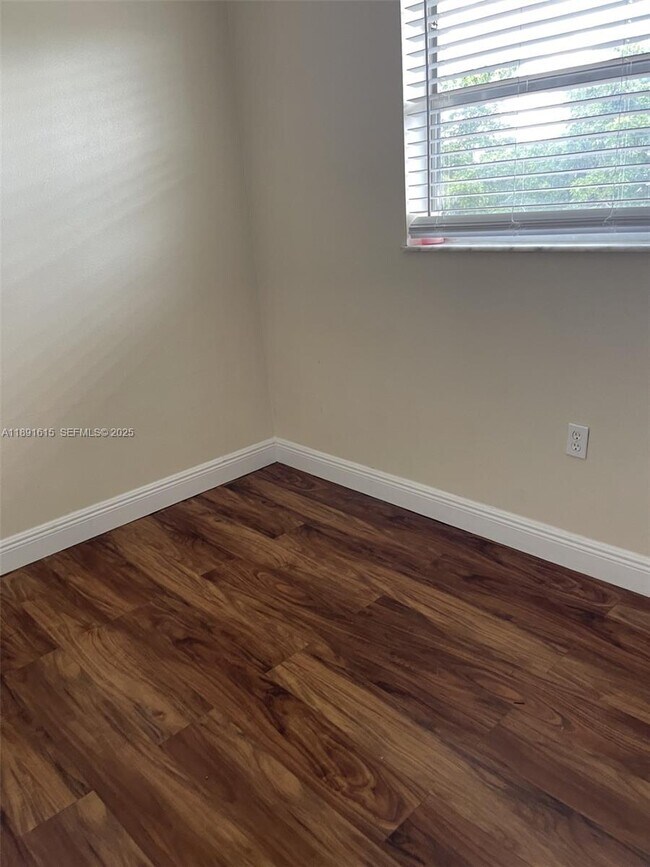 Building Photo - 8285 Sunrise Lakes Blvd