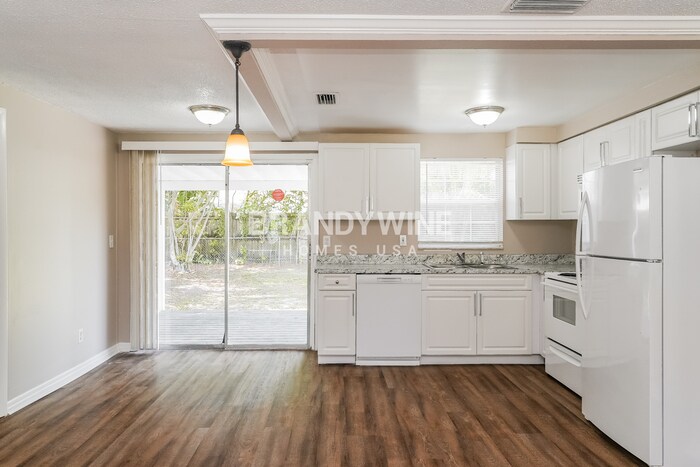 Building Photo - 8509 Portulaca Ave