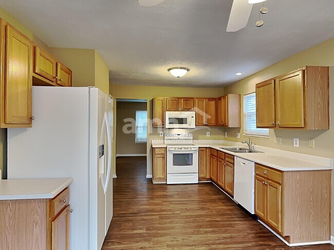 Building Photo - 6312 Satin Wood Dr